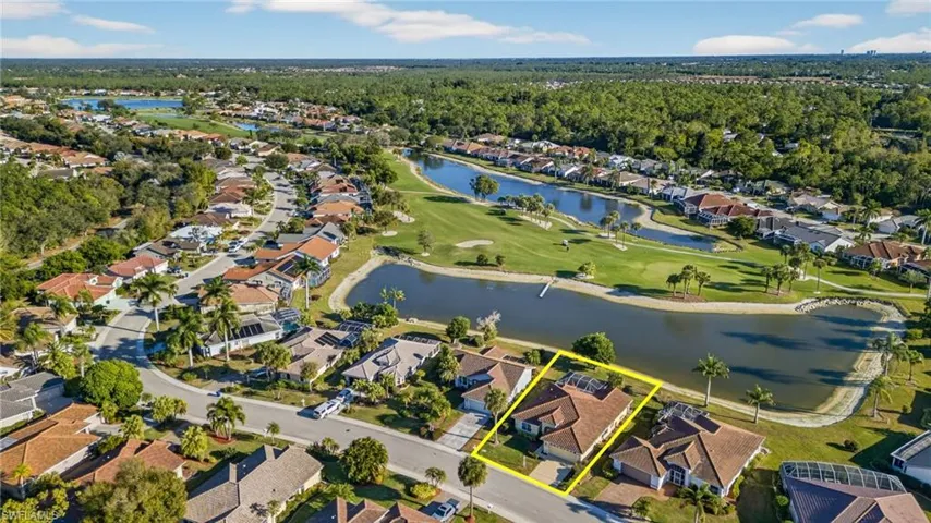 View of property location with nearby suburban area, property boundaries highlighted, and a nearby body of water