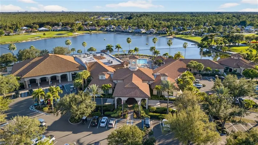 Aerial perspective of the amenities center. Featuring a clubhouse, ballrooms, restaurant, social rooms, pool, golf pro shop and more.