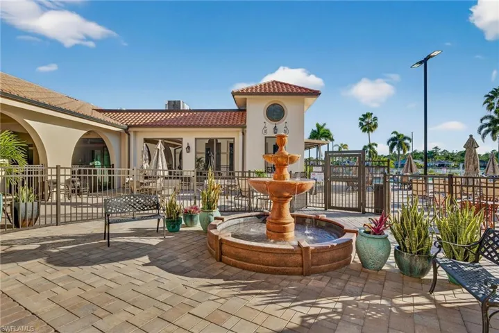 View of patio with a gate