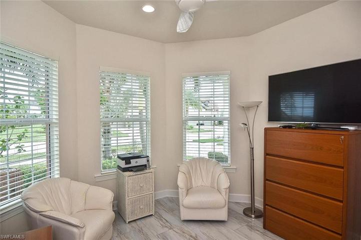 The second Guest Bedroom (front) has 3 windows offering much light.