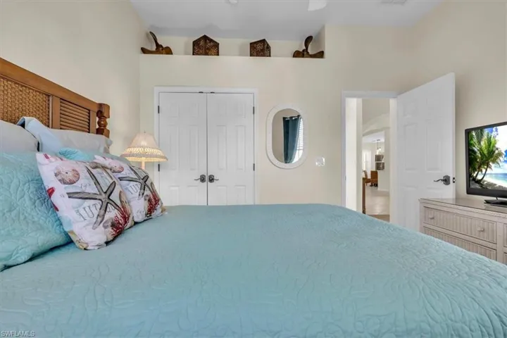 Bedroom with a closet and ceiling fan