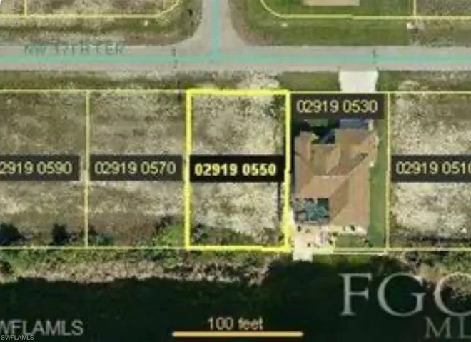 Aerial map of property and surrounding area featuring property parcel outlined