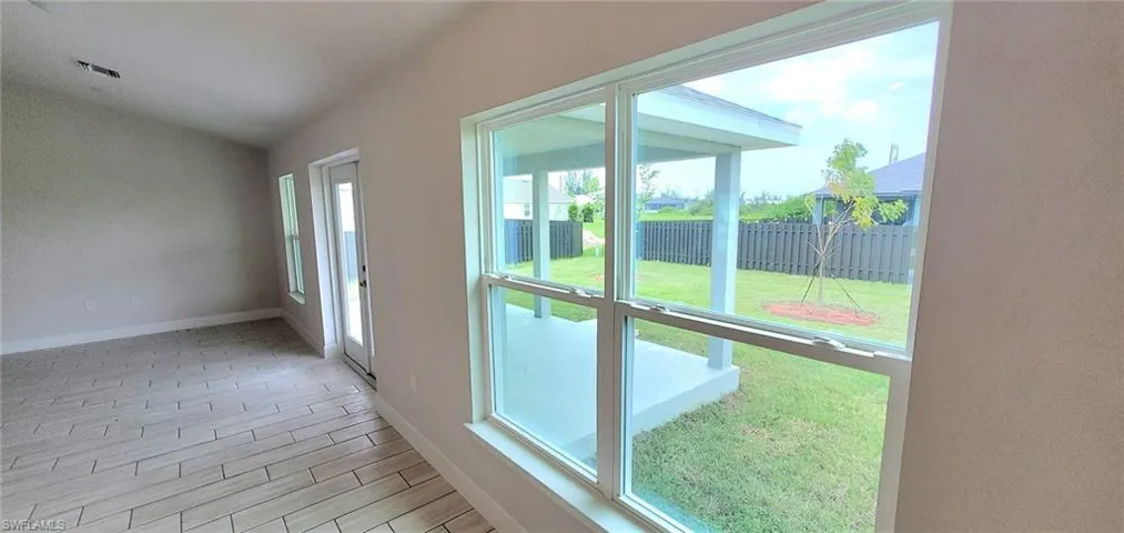 View of covered patio from dining nook