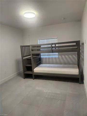 Bedroom with baseboards