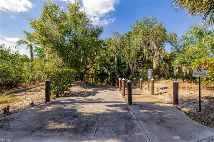 View of home's community with a boat ramp