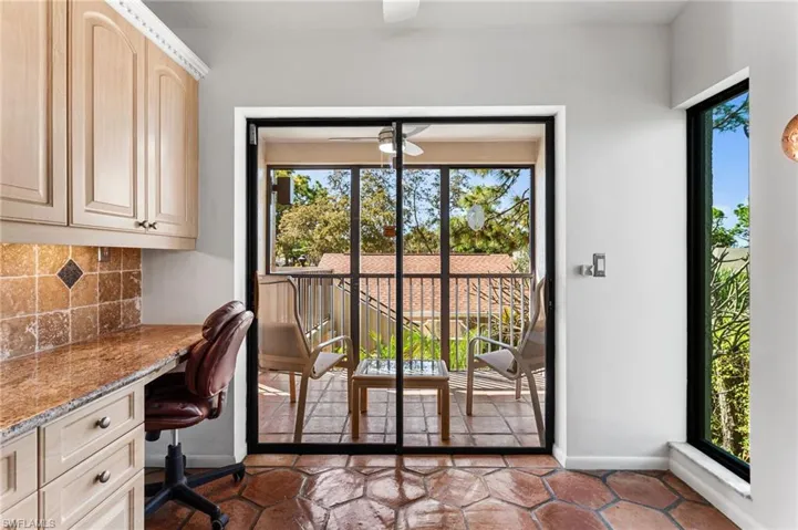 Kitchen has direct access to screened balcony--the perfect breakfast spot!