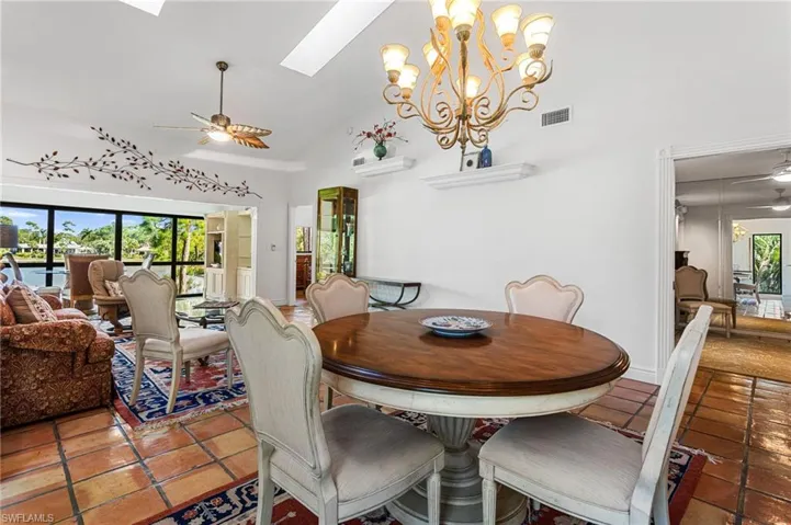 Dining area offers plenty of room to expand seating as needed (table comes with one leaf)
