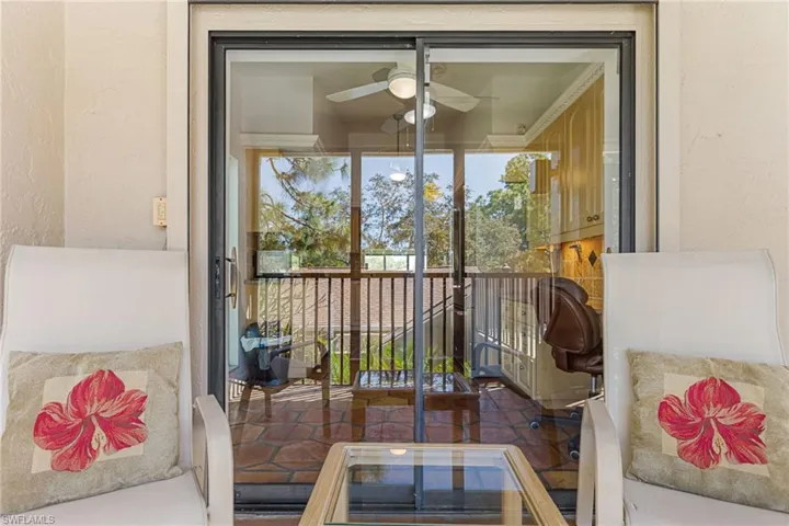 View of screened balcony looking toward kitchen