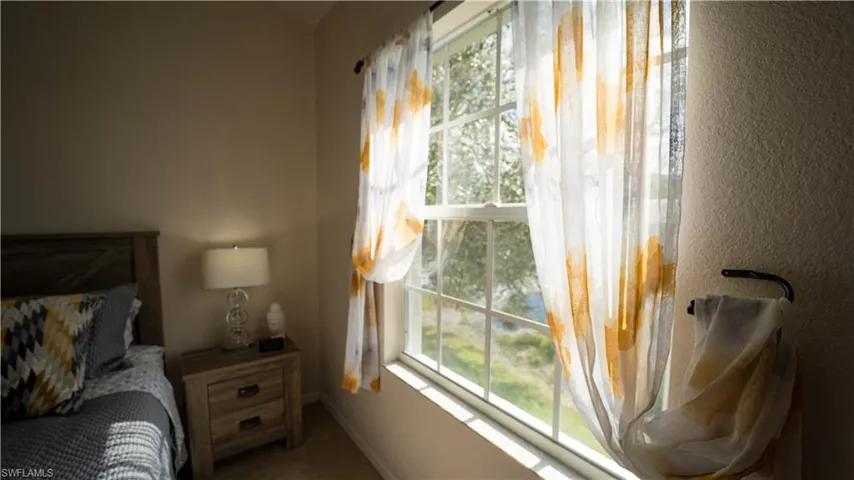 Bedroom featuring carpet