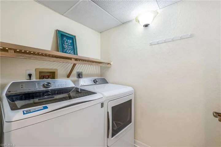In unit Laundry area with washing machine and dryer