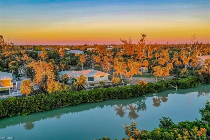 Aerial view at dusk with a water view