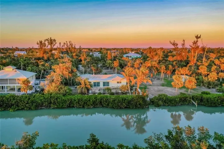 Aerial view at dusk with a water view