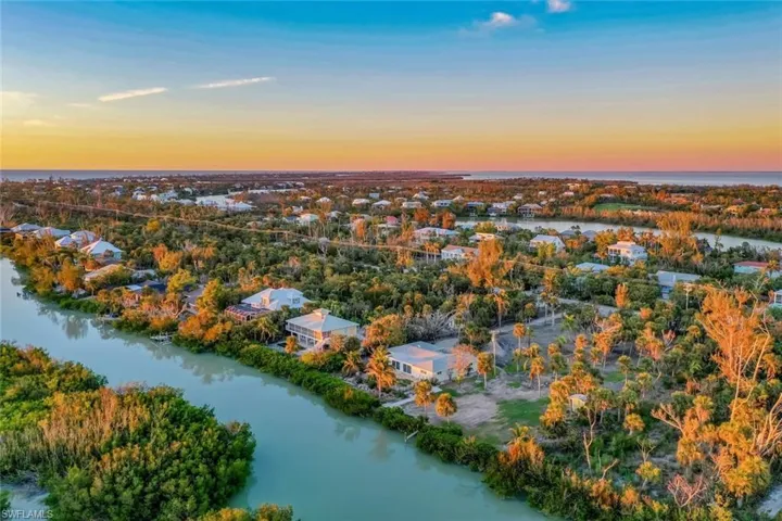 Aerial view at dusk with a water view