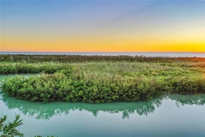 Aerial view at dusk with a water view