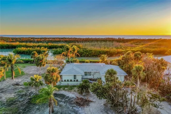 Aerial view at dusk with a water view
