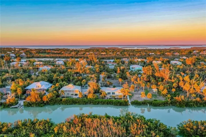 Aerial view at dusk with a water view