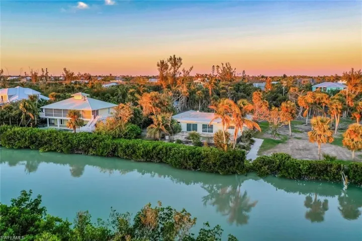 Aerial view at dusk with a water view