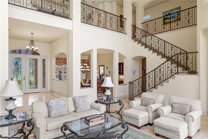 wrought iron spiral staircase inlaid with granite steps.