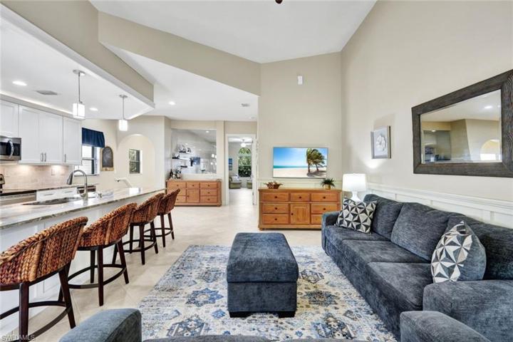 Living room is open to kitchen - notice the vaulted ceilings!