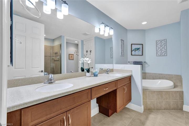 Primary bathroom offers plenty of room for two!