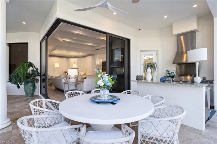 Dining room featuring recessed lighting and a ceiling fan