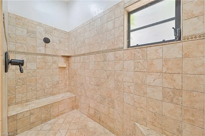 Bathroom with tiled shower