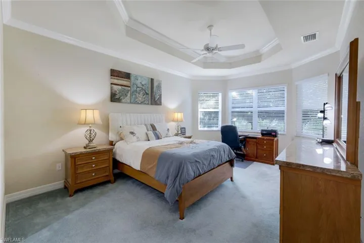 Master bedroom with tray ceilings, bump out bay window and two walk-in closets (not shown).