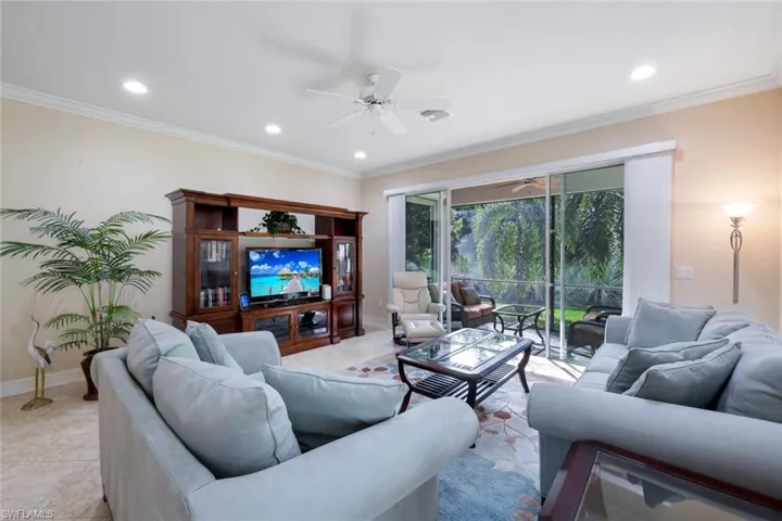 Family room with access to the lanai via glass sliding doors.