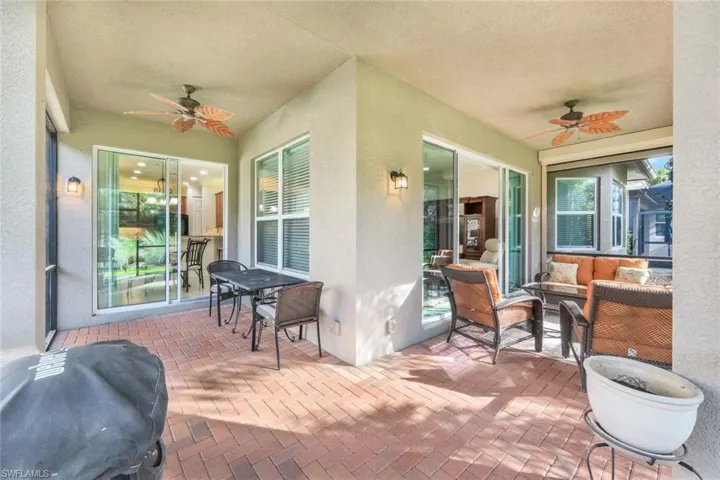 "L" shaped lanai with access via sliding doors.