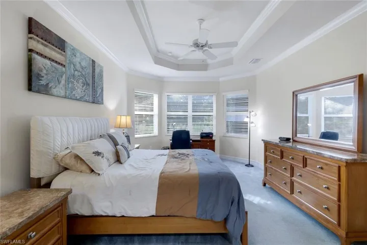 Master bedroom with tray ceilings, bump out bay window and two walk-in closets (not shown).