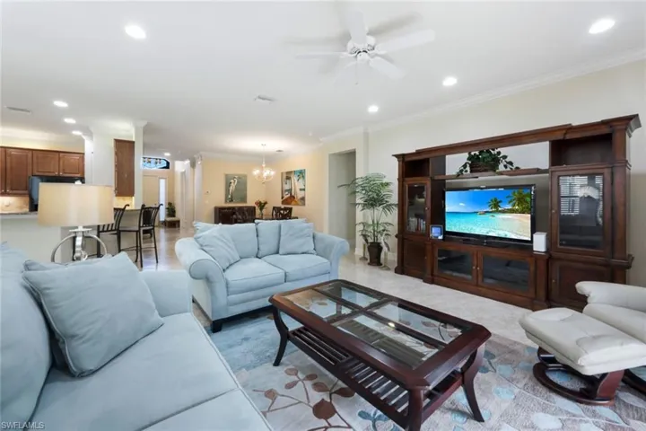 Family room with access to the lanai via glass sliding doors.