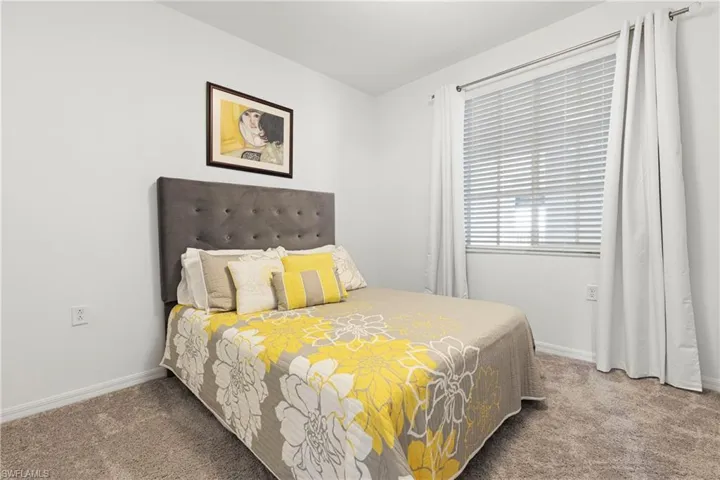 Bedroom featuring carpet