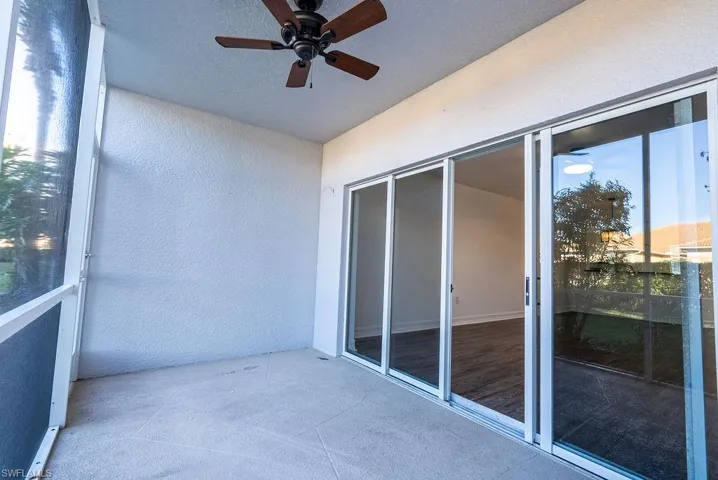 Balcony featuring ceiling fan