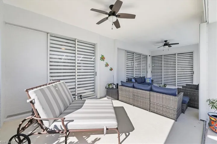 View of patio / terrace with an outdoor living space and a ceiling fan