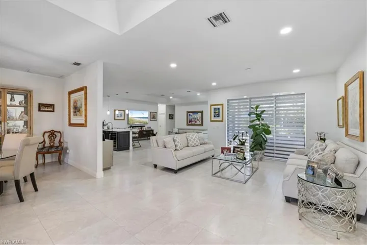 Living room featuring plenty of natural light and recessed lighting