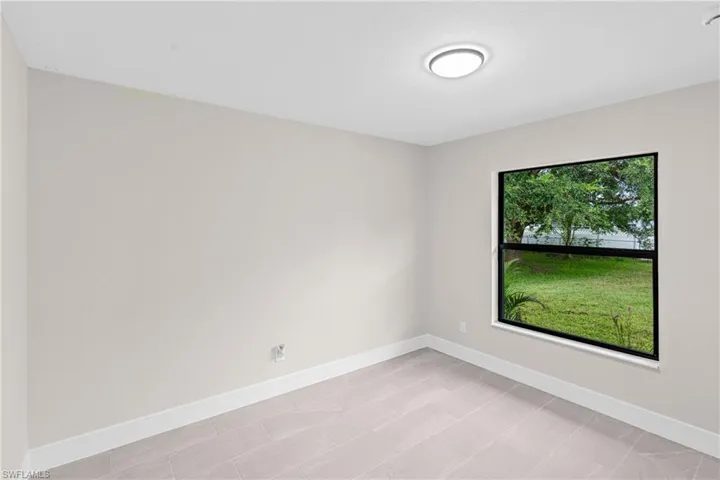 Empty room with baseboards