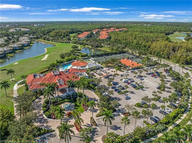 Bird's eye view of a large body of water and a local golf course