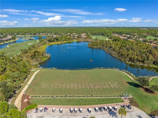 Bird's eye view of a nearby body of water and a golf course