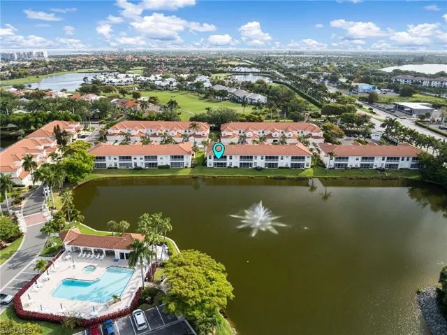 Ideally positioned to capture serene lake and fountain views, this residence also enjoys a short, convenient stroll to the community pool.