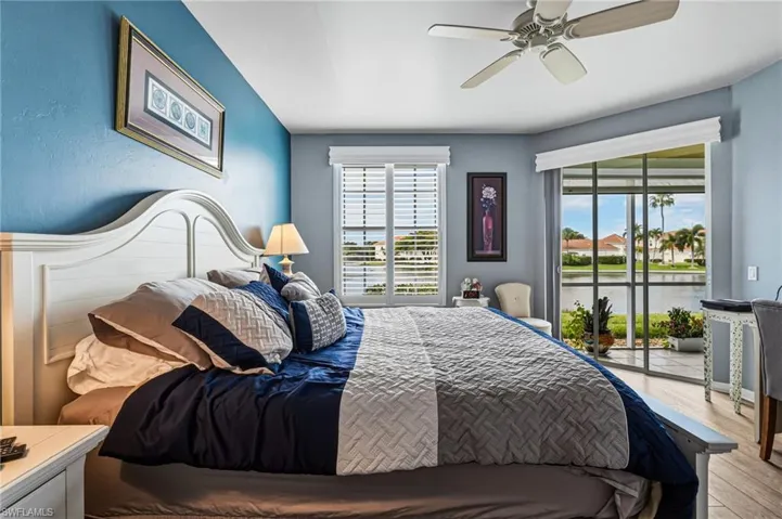 The primary bedroom offers private access to the lanai, where abundant natural light gracefully fills the space, while exquisitely crafted window casings provide a refined and polished finishing touch.