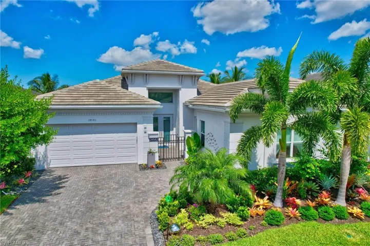 View of front of property featuring a garage
