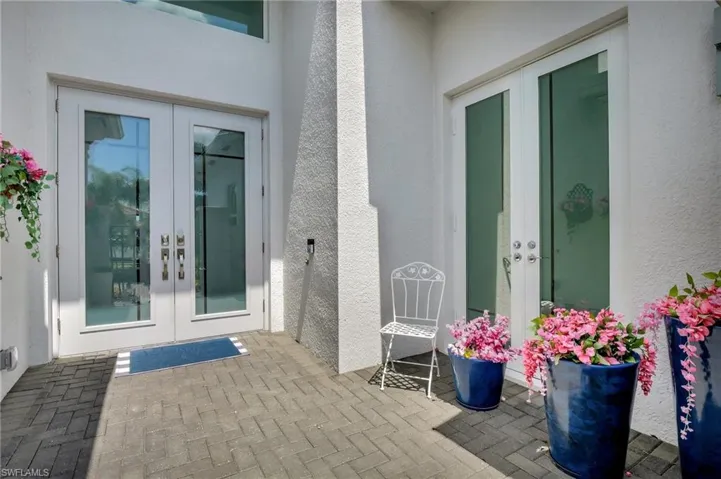Property entrance with french doors