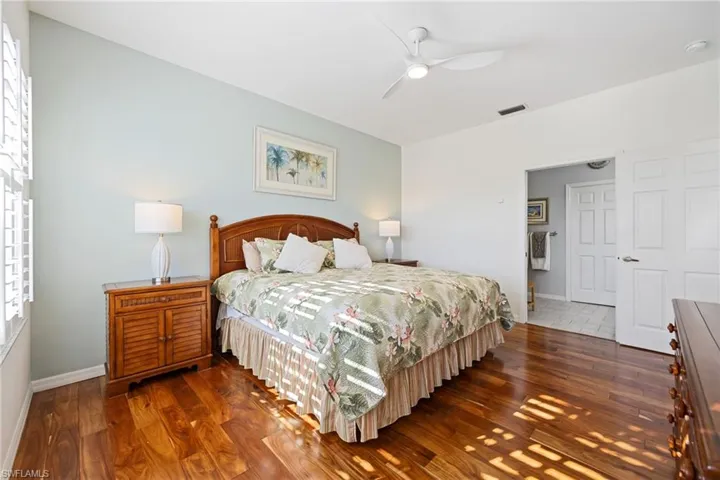 Primary Bedroom opens to ensuite bathroom and walk in closet.