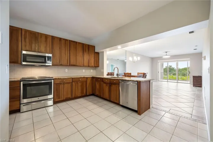 Kitchen is FULLY Renovated. Hickory solid wood cabinets. All new appliances.