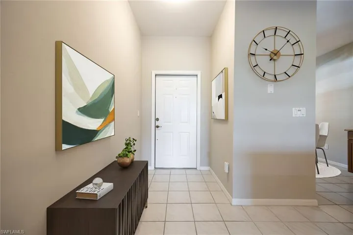 Front foyer/entry. Note: virtually staged