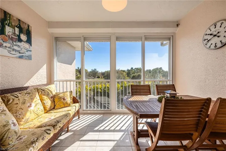 Spacious Lanai, with Tiled flooring, vinyl sliding glass doors, upgraded noseum quality screens, electric operated hurrican shutter. Enjoy the gorgeous golf course views from the 2nd floor.