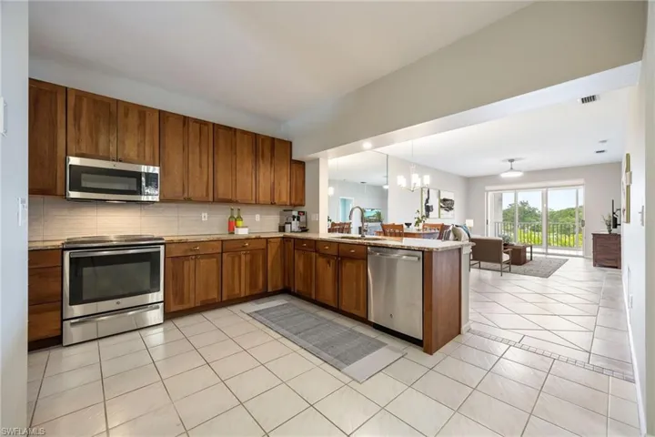 Kitchen is FULLY Renovated. Hickory solid wood cabinets. All new appliances. Note: virtually staged.