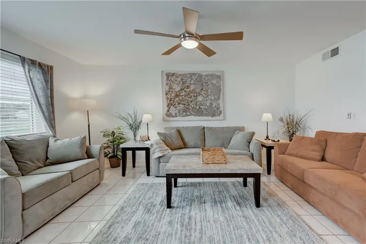 Family room with plenty of seating, including one sofa/sleeper.