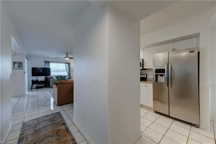 View upon entry into foyer. Open floor plan to family room & dining area and kitchen.