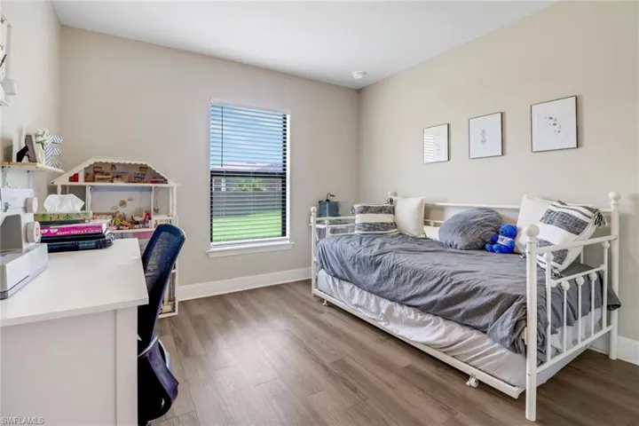 Bedroom featuring hardwood / wood-style flooring